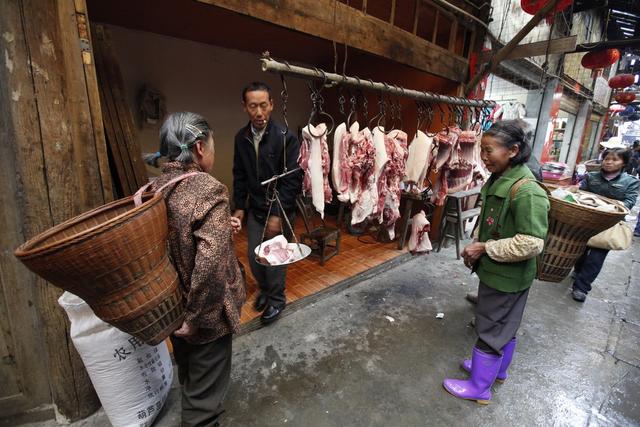 覃正丸的肉铺